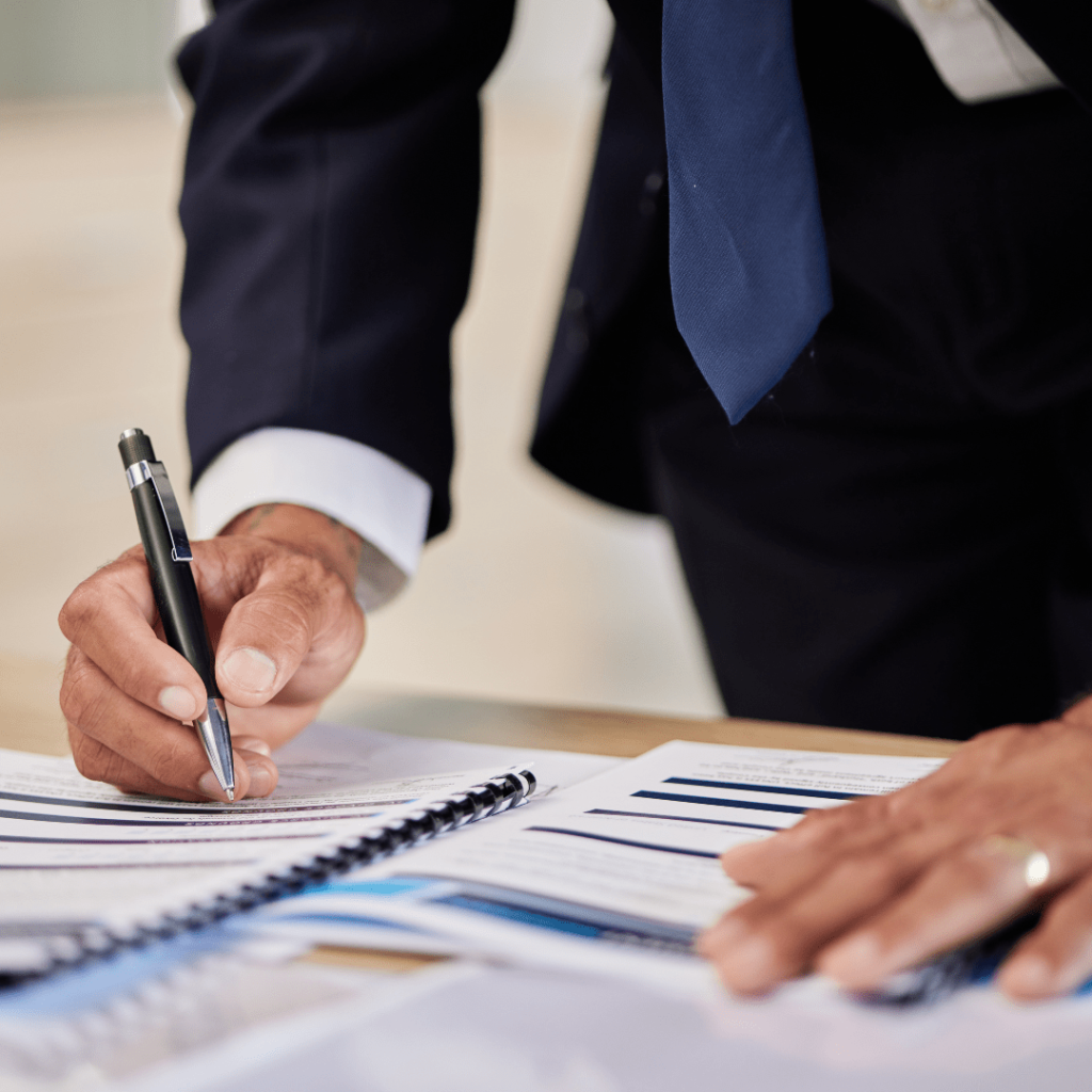 person signing contracts